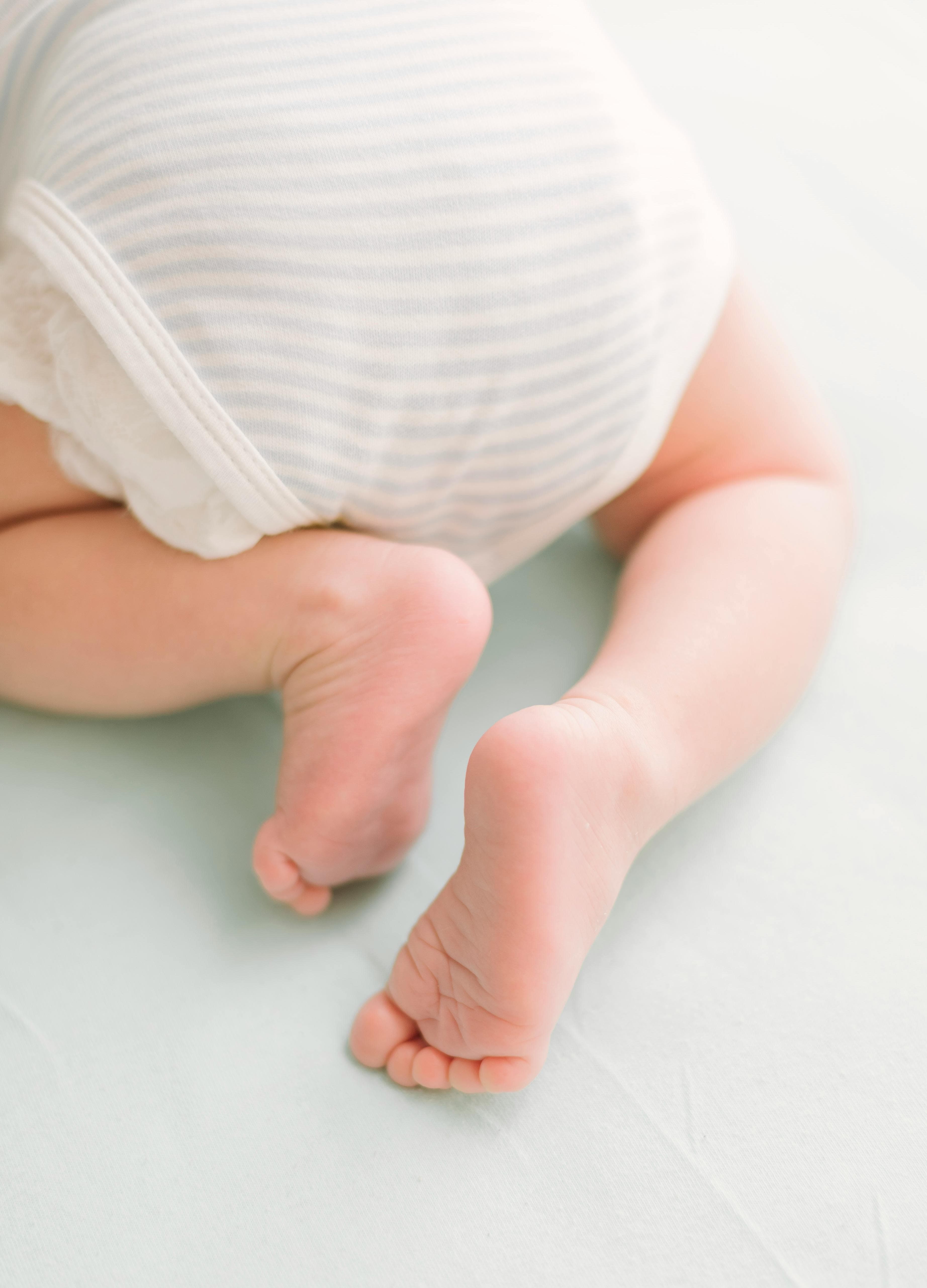 Baby's feet in a diaper